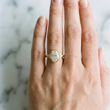 Yellow gold Oval Cut Diamond Halo Ring with Tapered Band and Four-Prong Setting_52