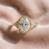 Yellow gold Oval Cut Diamond Halo Ring with Tapered Band and Four-Prong Setting_55