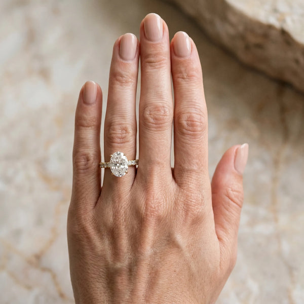 Yellow gold Oval Cut Diamond Pavé Band Solitaire Ring with Prong Setting