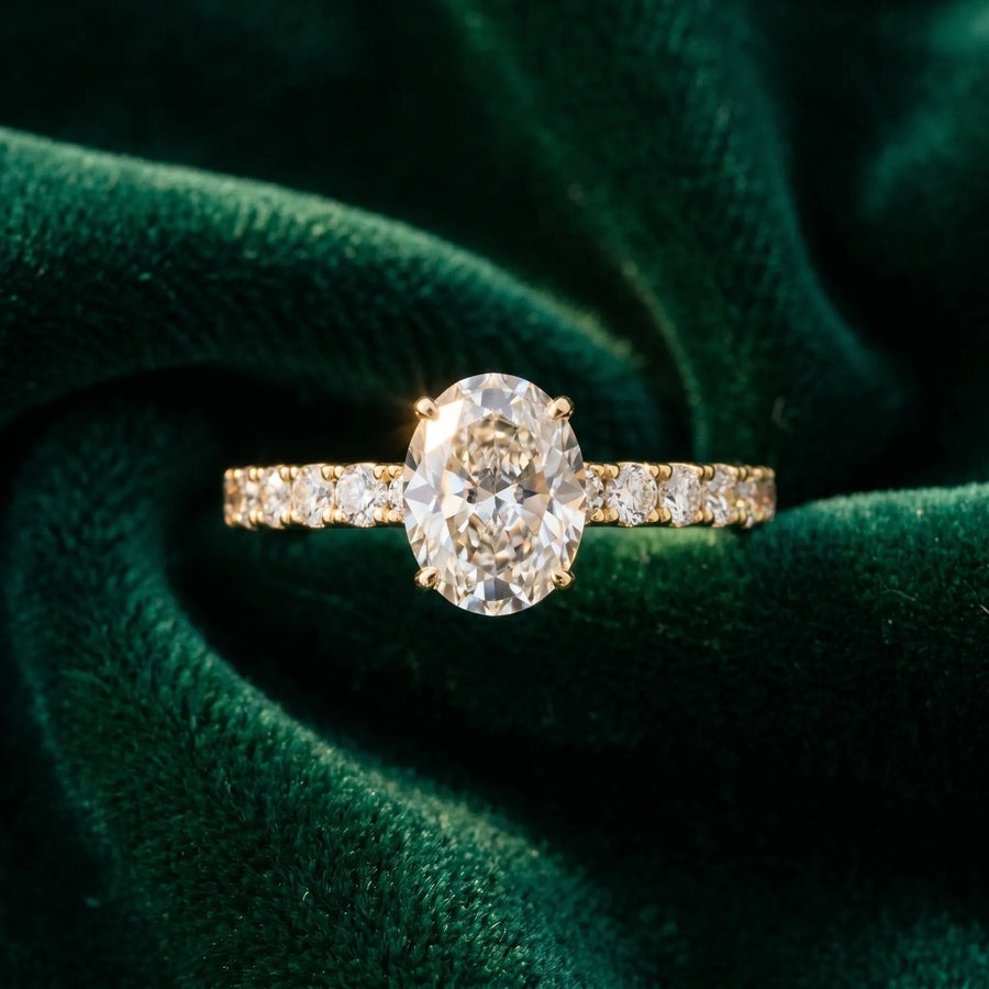 Yellow gold Oval Cut Diamond Pavé Band Solitaire Ring with Prong Setting