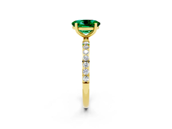 Yellow gold Oval Cut Emerald Solitaire Ring with Round Pavé Shoulders and Prong Setting