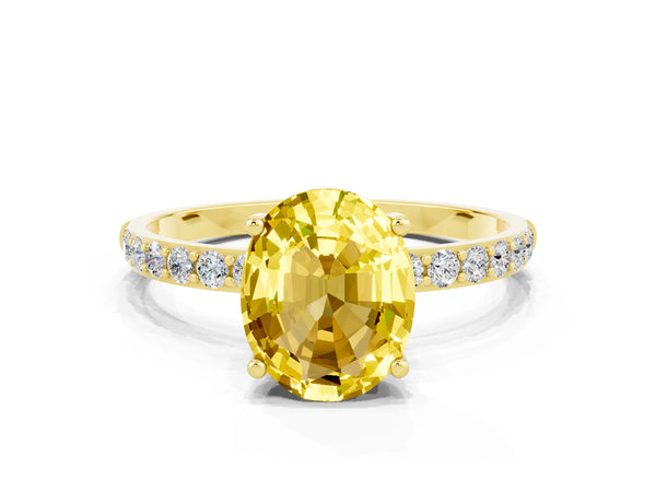 Yellow gold Oval Cut Yellow Sapphire Solitaire Ring with Round Pavé Shoulders and Prong Setting