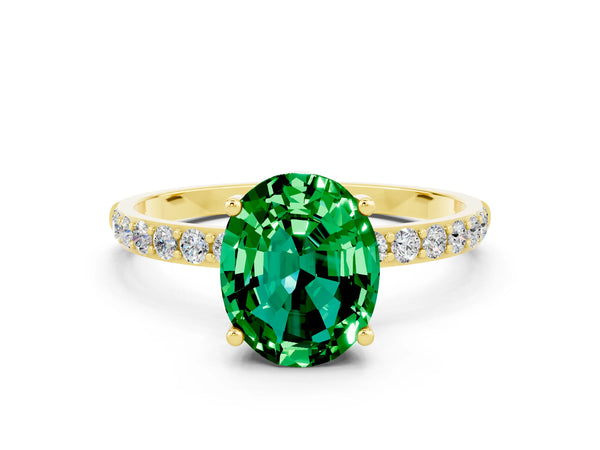 Yellow gold Oval Cut Emerald Solitaire Ring with Round Pavé Shoulders and Prong Setting