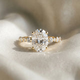 Yellow gold Oval Cut Diamond Prong Set Engagement Ring with Pavé Band_250