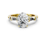 Yellow gold Oval Cut Diamond Ring with Baguette Side Stones, Channel Set Band, and Four-Prong Setting_25