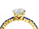 Yellow gold Oval Cut Diamond Ring with Marquise and Round with Blue Sapphire side stone Side Stones and Four-Prong Setting_52