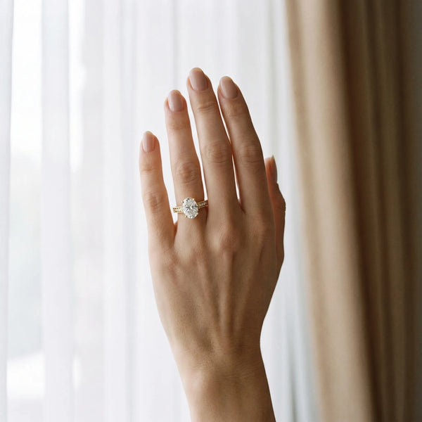 Yellow gold Oval Cut Diamond Ring with Milgrain Pavé Band and Four-Prong Setting