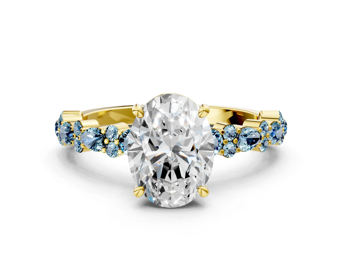 Yellow gold Oval Cut Diamond Side Stone Solitaire Ring with Round with Aquamarine side stone and Four-Prong Setting