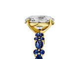 Yellow gold Oval Cut Diamond Side Stone Solitaire Ring with Round with Blue Sapphire side stone and Four-Prong Setting_5