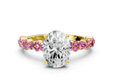 Yellow gold Oval Cut Diamond Side Stone Solitaire Ring with Round with Pink Sapphire side stone and Four-Prong Setting