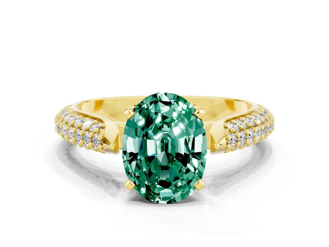 Yellow gold Oval Cut Diamond Solitaire Engagement Ring with Pavé Band and Four-Prong Setting