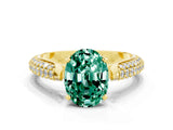 Yellow gold Oval Cut Diamond Solitaire Engagement Ring with Pavé Band and Four-Prong Setting