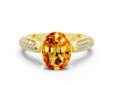 Yellow gold Oval Cut Diamond Solitaire Engagement Ring with Pavé Band and Four-Prong Setting