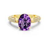 Yellow gold Oval Cut Diamond Solitaire Engagement Ring with Pavé Band and Four-Prong Setting