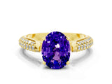 Yellow gold Oval Cut Diamond Solitaire Engagement Ring with Pavé Band and Four-Prong Setting