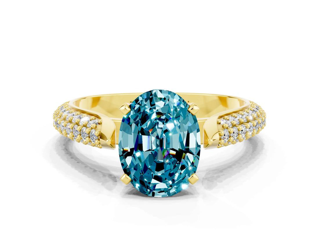 Yellow gold Oval Cut Diamond Solitaire Engagement Ring with Pavé Band and Four-Prong Setting