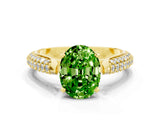 Yellow gold Oval Cut Diamond Solitaire Engagement Ring with Pavé Band and Four-Prong Setting