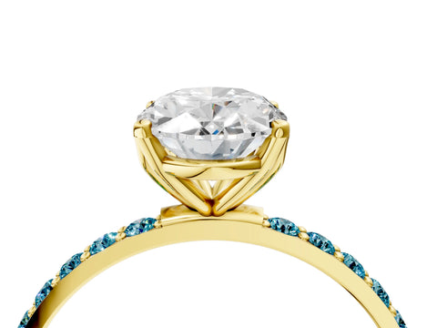 Yellow gold Oval Cut Diamond Solitaire Engagement Ring with Round with Blue Topaz side stone Pavé Band and Prong Setting_4