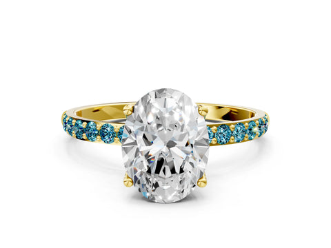 Yellow gold Oval Cut Diamond Solitaire Engagement Ring with Round with Blue Topaz side stone Pavé Band and Prong Setting