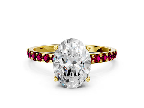 Yellow gold Oval Cut Diamond Solitaire Engagement Ring with Round with Garnet side stone Pavé Band and Prong Setting