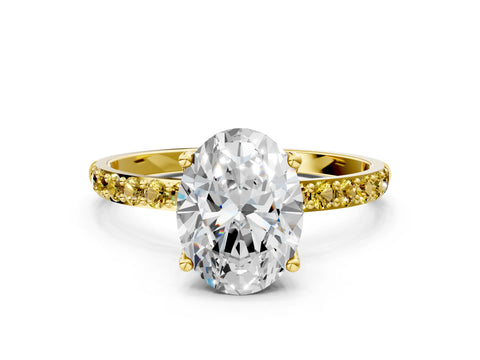 Yellow gold Oval Cut Diamond Solitaire Engagement Ring with Round with Yellow Sapphire side stone Pavé Band and Prong Setting