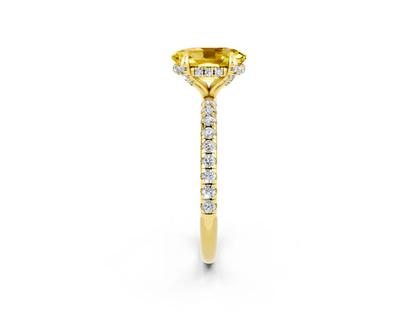 Yellow gold Oval Cut Yellow Sapphire Hidden Halo Engagement Ring with Round Pavé Band and Prong Setting