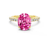 Yellow gold Oval Cut Diamond Solitaire Ring with Four-Prong Setting and Pavé Band