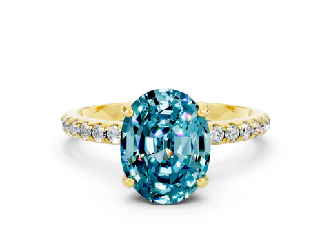 Yellow gold Oval Cut Diamond Solitaire Ring with Four-Prong Setting and Pavé Band