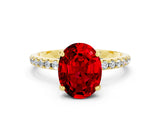 Yellow gold Oval Cut Diamond Solitaire Ring with Four-Prong Setting and Pavé Band