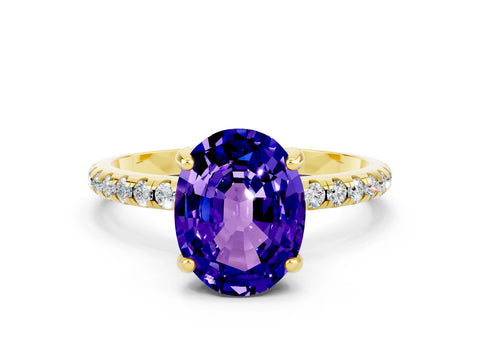 Yellow gold Oval Cut Diamond Solitaire Ring with Four-Prong Setting and Pavé Band
