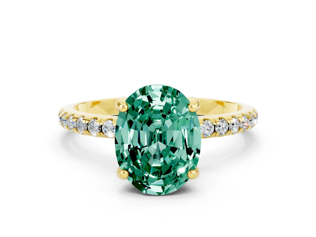 Yellow gold Oval Cut Diamond Solitaire Ring with Four-Prong Setting and Pavé Band