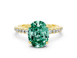 Yellow gold Oval Cut Diamond Solitaire Ring with Four-Prong Setting and Pavé Band