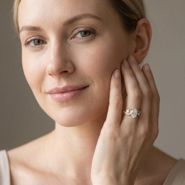 Yellow gold Oval Cut Diamond Solitaire Ring with Milgrain Pavé Band and Four-Prong Setting