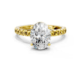 Yellow gold Oval Cut Diamond Solitaire Ring with Pavé Band and Four-Prong Setting