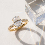 14K Yellow Gold 2.08 Carat D VVS2 Oval Diamond Solitaire Ring with Round Pavé Band and Four-Prong Setting