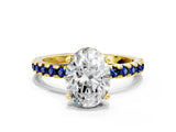 Yellow gold Oval Cut Diamond Solitaire Ring with Pavé Band and Four-Prong Setting