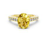 Yellow gold Oval Cut Diamond Solitaire Ring with Pavé Band and Prong Setting