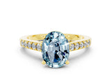 Yellow gold Oval Cut Diamond Solitaire Ring with Pavé Band and Prong Setting