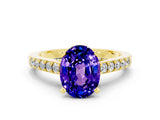 Yellow gold Oval Cut Diamond Solitaire Ring with Pavé Band and Prong Setting