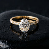 Yellow gold Oval Cut Diamond Solitaire Ring with Pave Band and Four Prong Setting_411