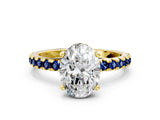 Yellow gold Oval Cut Diamond Solitaire Ring with Round with Blue Sapphire side stone Pavé Band and Four-Prong Setting_36