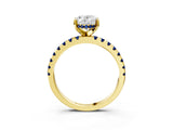 Yellow gold Oval Cut Diamond Solitaire Ring with Round with Blue Sapphire side stone Pavé Band and Four-Prong Setting_39