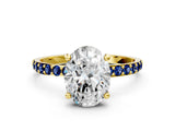 Yellow gold Oval Cut Diamond Solitaire Ring with Round with Blue Sapphire side stone Pavé Band and Prong Setting_12