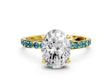 Yellow gold Oval Cut Diamond Solitaire Ring with Round with Blue Topaz side stone Pavé Band and Prong Setting_12