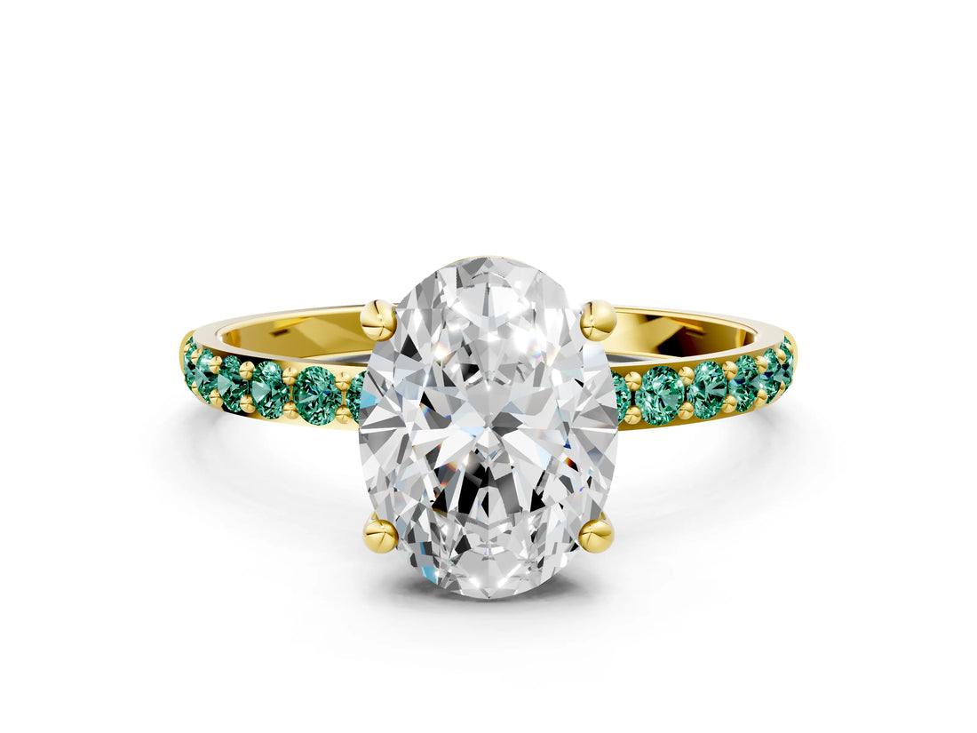 Yellow gold Oval Cut Diamond Solitaire Ring with Round with Green Sapphire side stone Pavé Band and Prong Setting