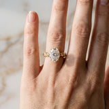 Yellow gold Oval Cut Diamond Solitaire Ring with Twisted Band and Pavé Accents_42