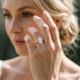 Yellow gold Oval Cut Diamond Solitaire Ring with Twisted Band and Pavé Accents_44