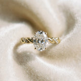 Yellow gold Oval Cut Diamond Solitaire Ring with Twisted Band and Pavé Accents_45