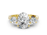 Yellow gold Oval Cut Diamond Three-Stone Engagement Ring with Prong Setting and Pavé Band_3