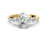 14K Yellow Gold 1.16 Carat D VVS2 Oval Diamond Three-Stone Ring with Pear Side Stones and Prong Setting